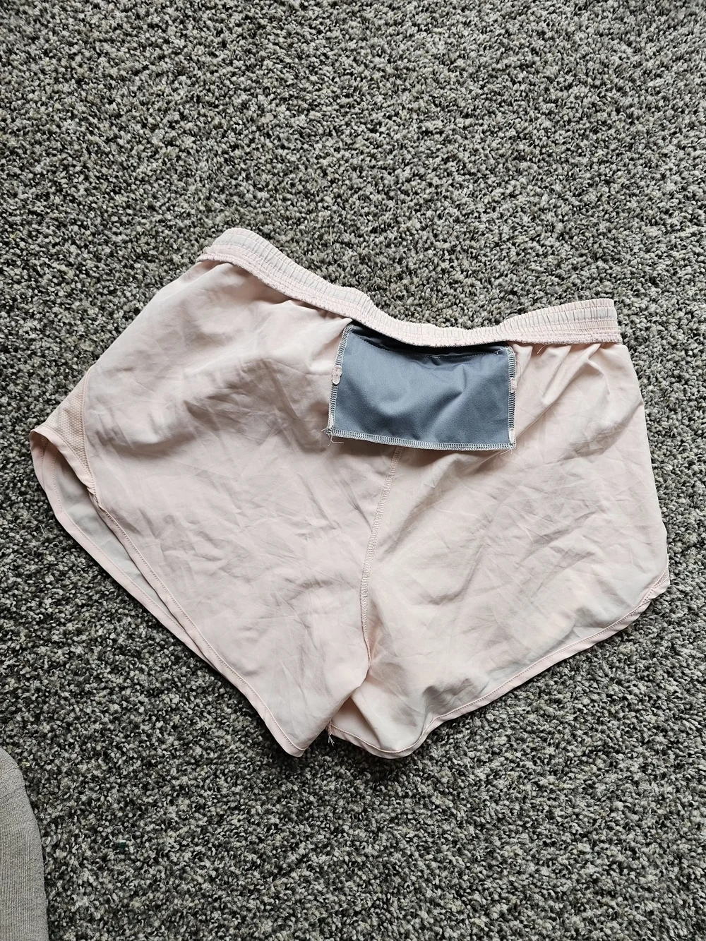 Nike Women’s Light Pink Athletic Running Shorts with Black Drawstring